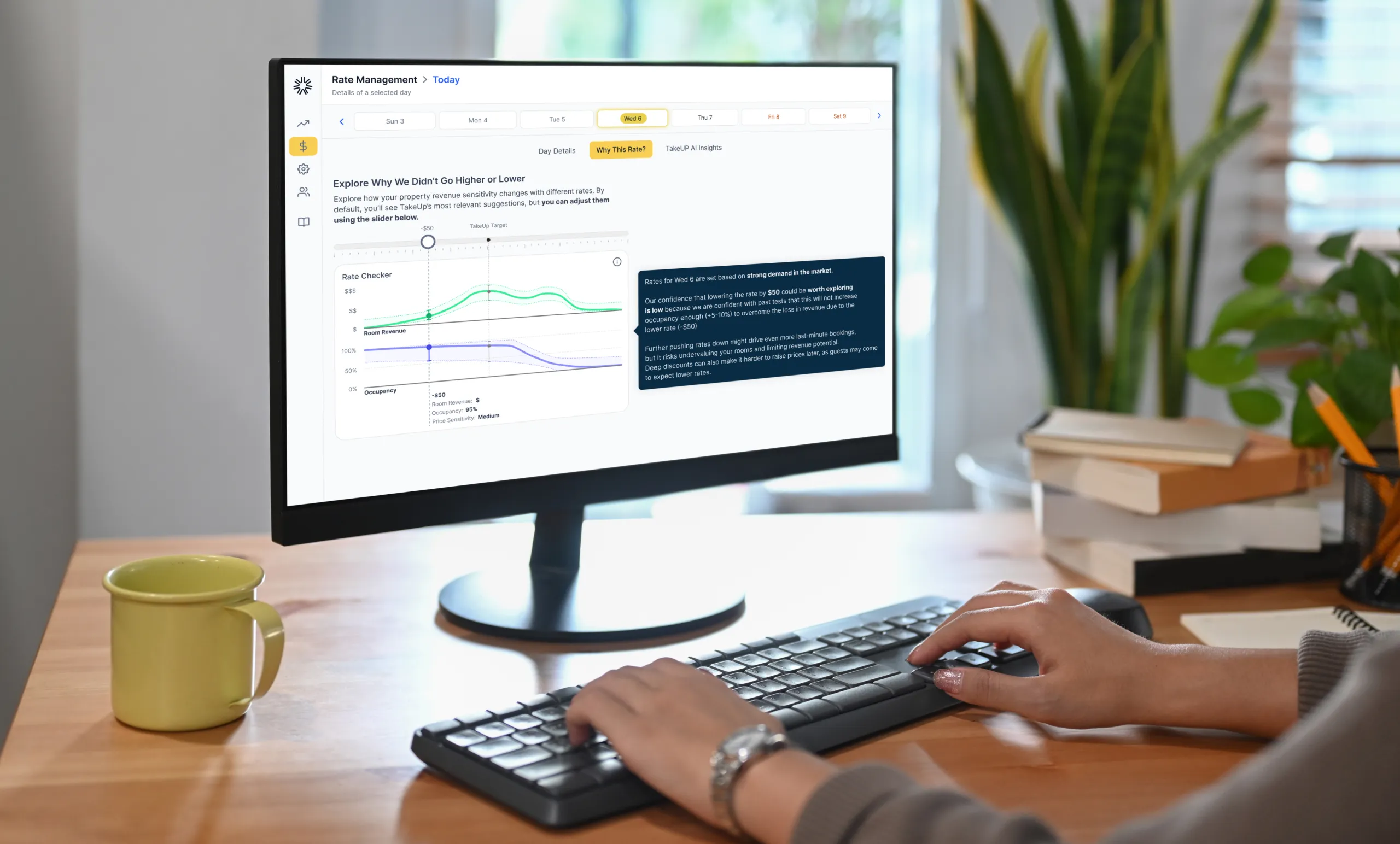 Rate management screen displayed on desktop computer as person types