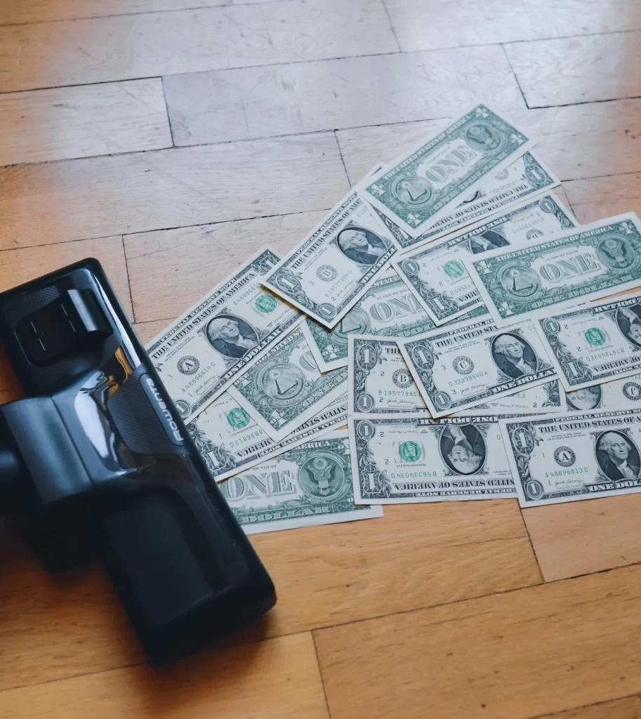 Vacuum sucking up money