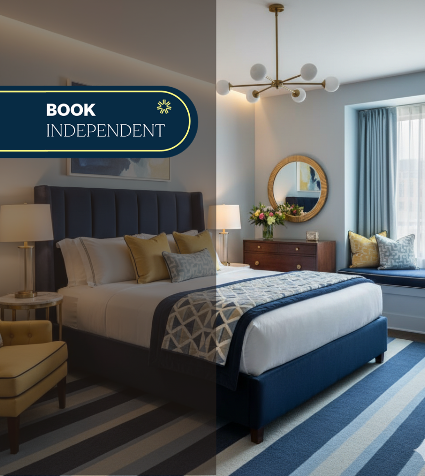 Boutique hotel room with luxury bedding and window seat